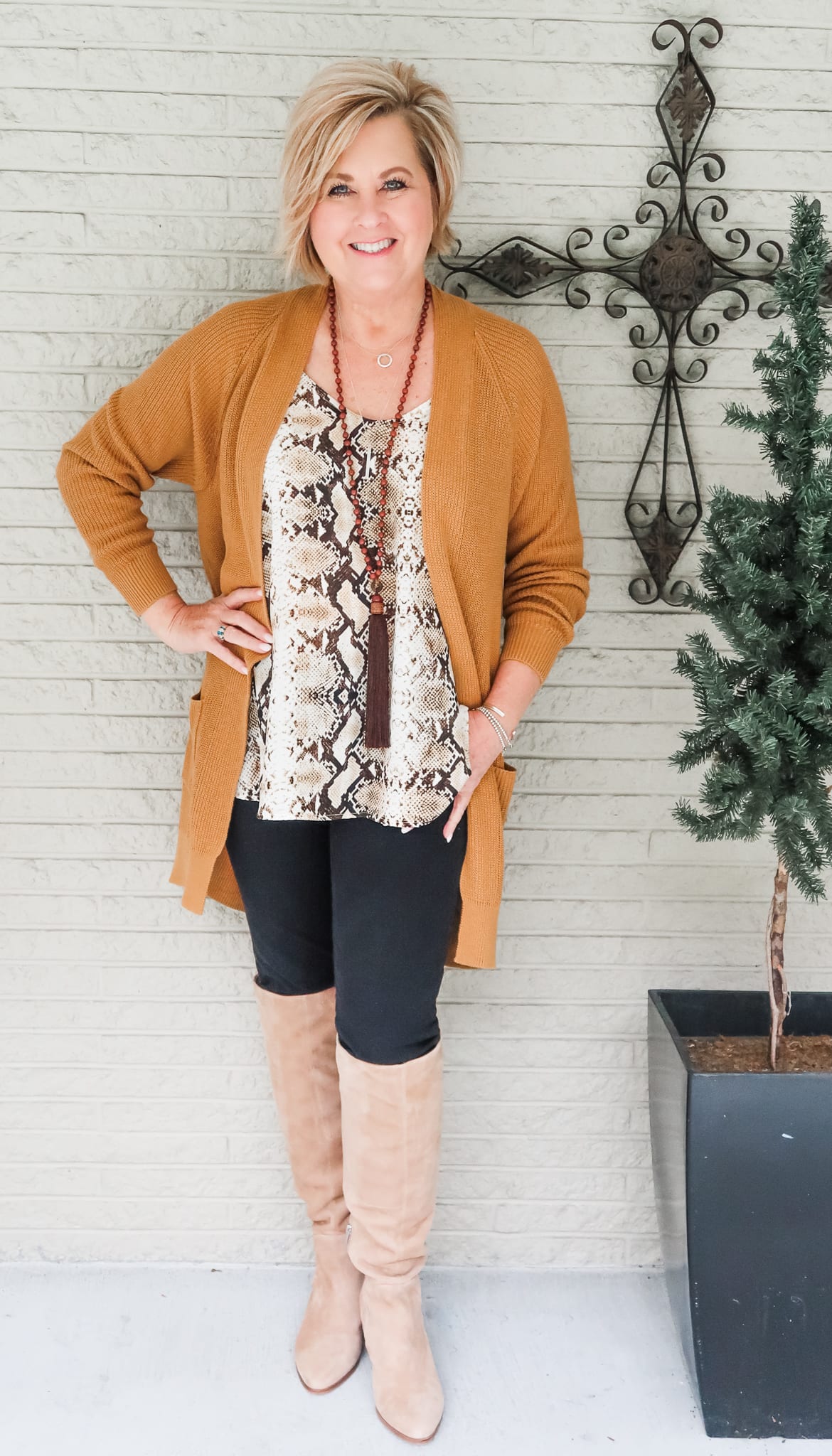 Over 40 Fashion Blogger, Tania Stephens, is wearing Suede Knee High Boots with her fall jeans