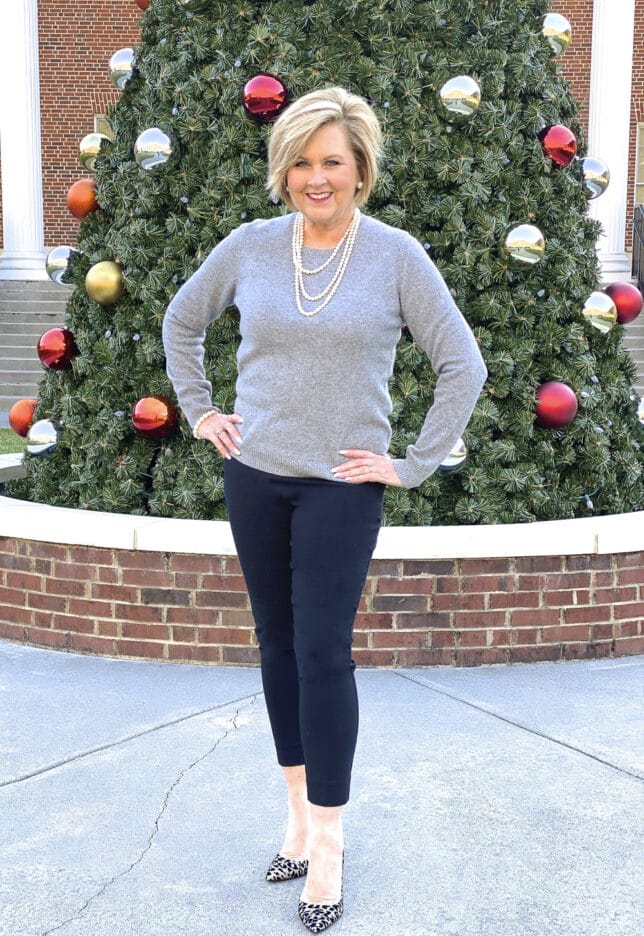 Fashion Blogger 50 Is Not Old wearing a classic gray cashmere sweater