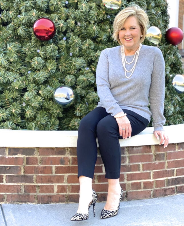 Fashion Blogger 50 Is Not Old wearing a classic cashmere sweater