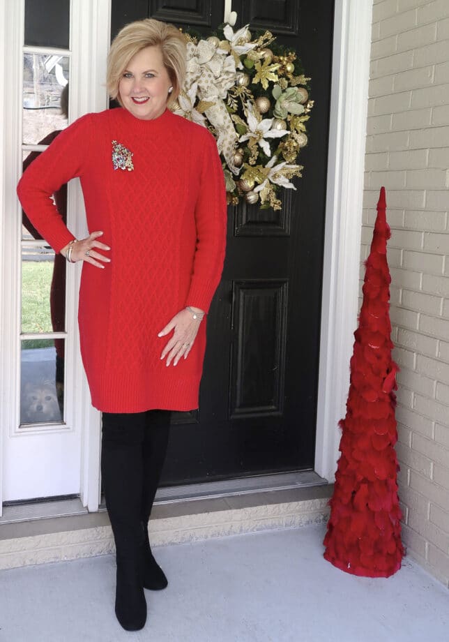 Fashion Blogger 50 is not old wearing a red sweater dress