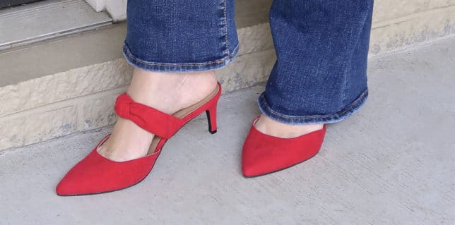 FASHION BLOGGER 50 Is Not Old styles red bow mules with flare jeans