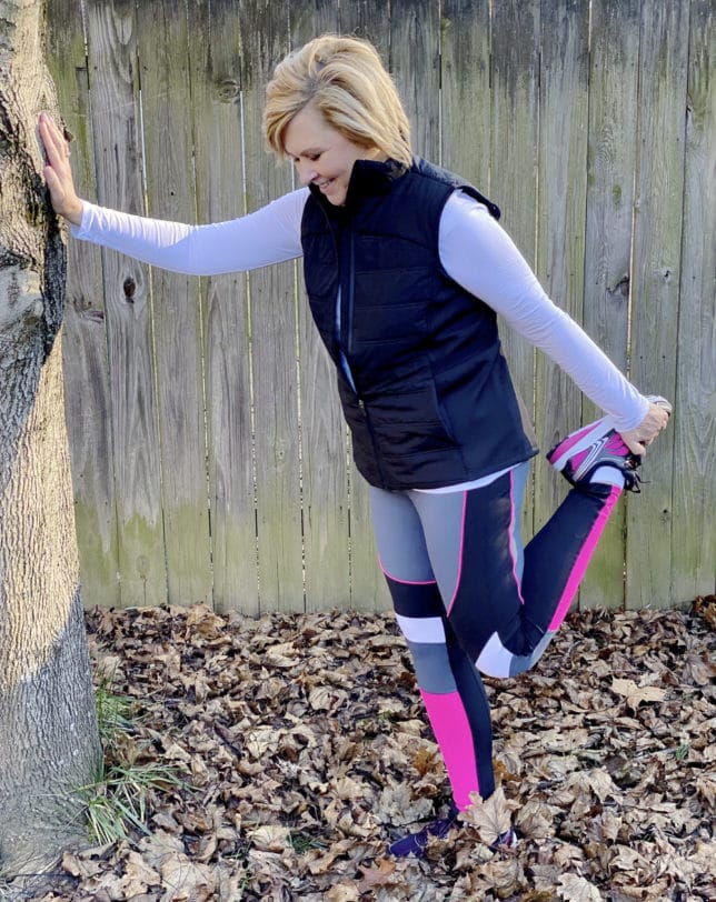Fashion Blogger 50 Is Not Old wearing Avia leggings and a quilted vest from Walmart