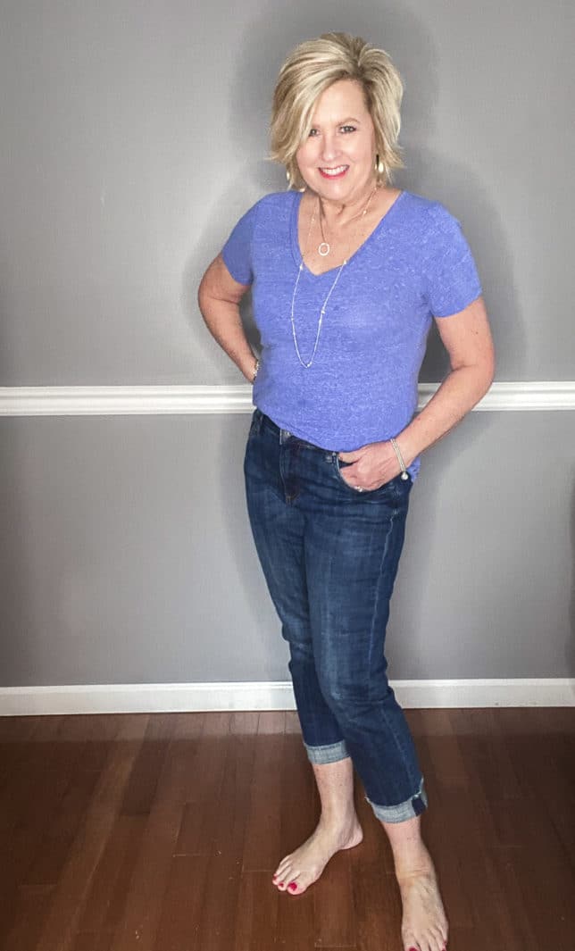 Fashion Blogger 50 Is Not Old wearing a pair of cuffed jeans from Kut From The Kloth and a blue v-neck t-shirt