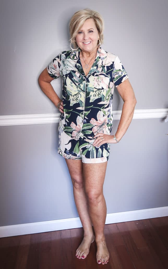 Fashion Blogger 50 Is Not Old wearing a floral button up pajama set
