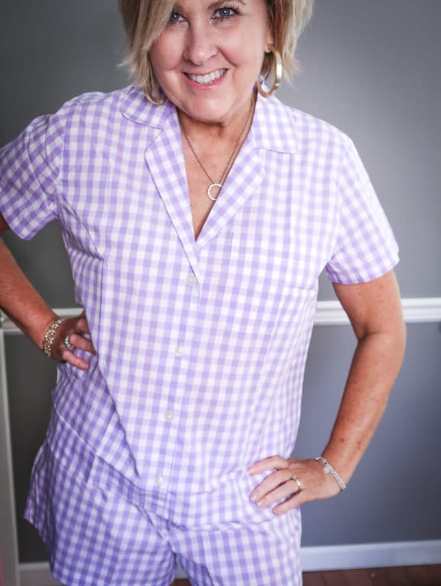 Fashion Blogger 50 Is Not Old wearing a gingham button up pajama set