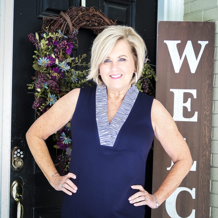 Fashion Blogger 50 Is Not Old is celebrating turning 60 with a navy sheath dress from Eliza J