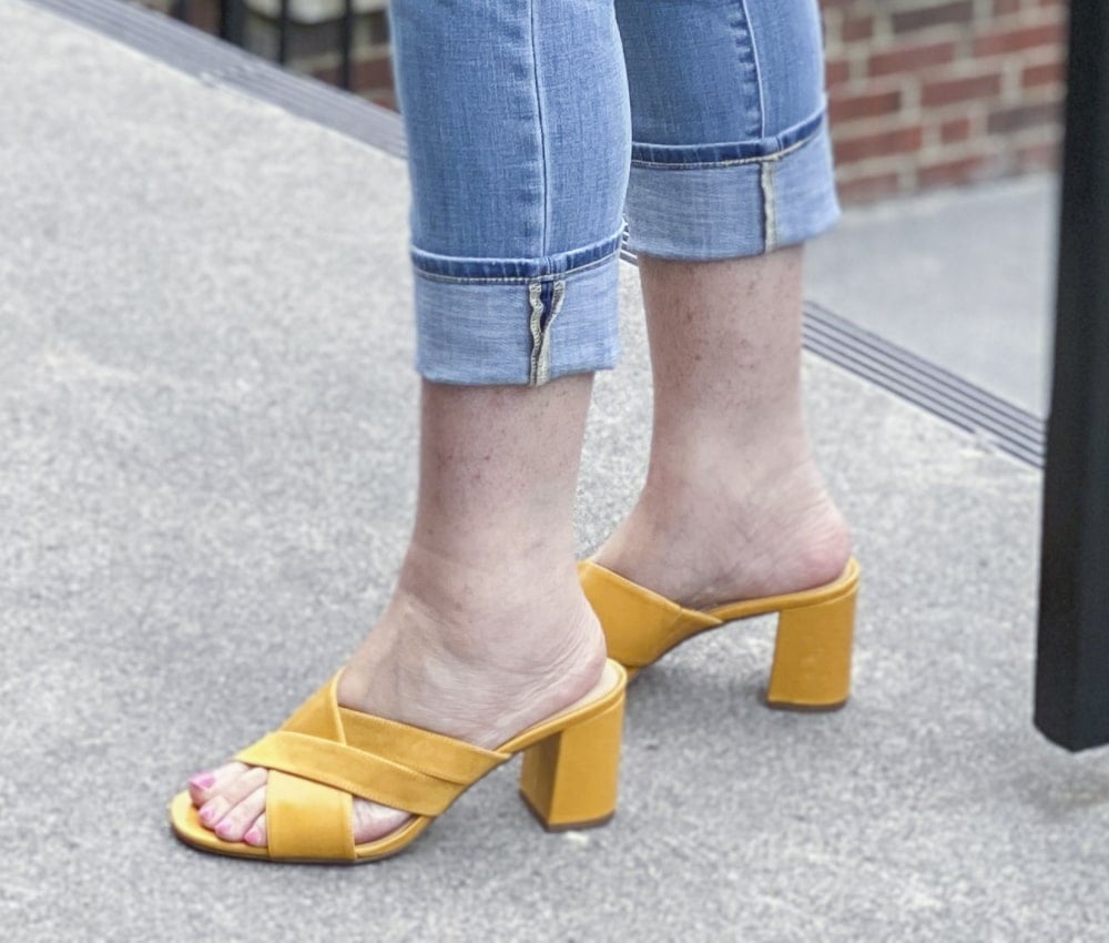 Fashion Blogger 50 Is Not Old is wearing mustard yellow block heel sandals