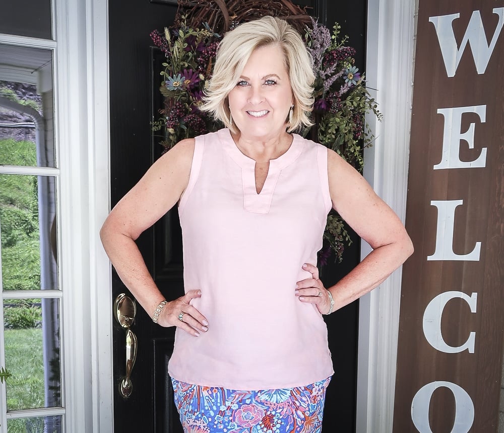 Fashion Blogger 50 Is Not Old is wearing a pale linen v neck top