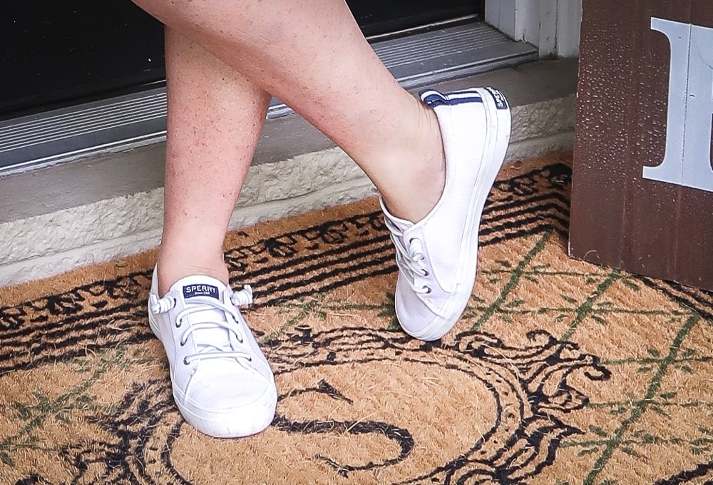 Fashion Blogger 50 Is Not Old is wearing a pair of Sperry no-tie sneakers