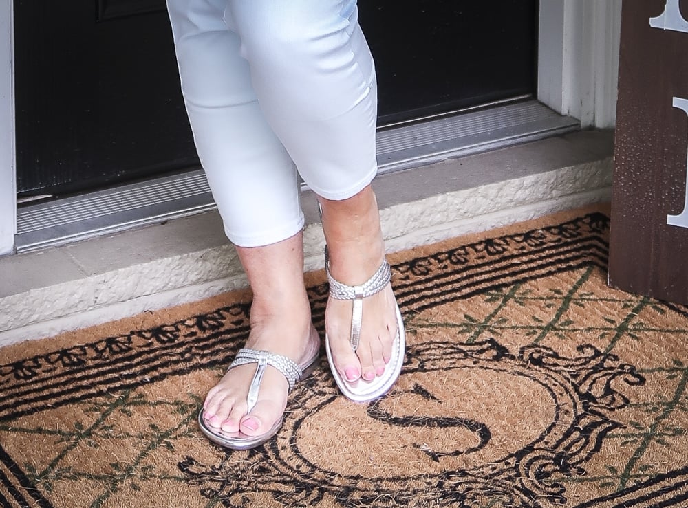 Fashion Blogger 50 Is Not Old is wearing silver braided sandals