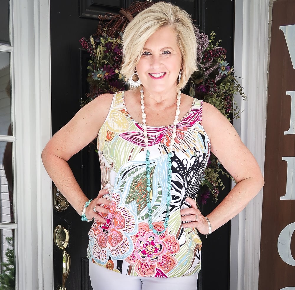 Fashion Blogger 50 Is Not Old is looking summery in a bright tropical tank top
