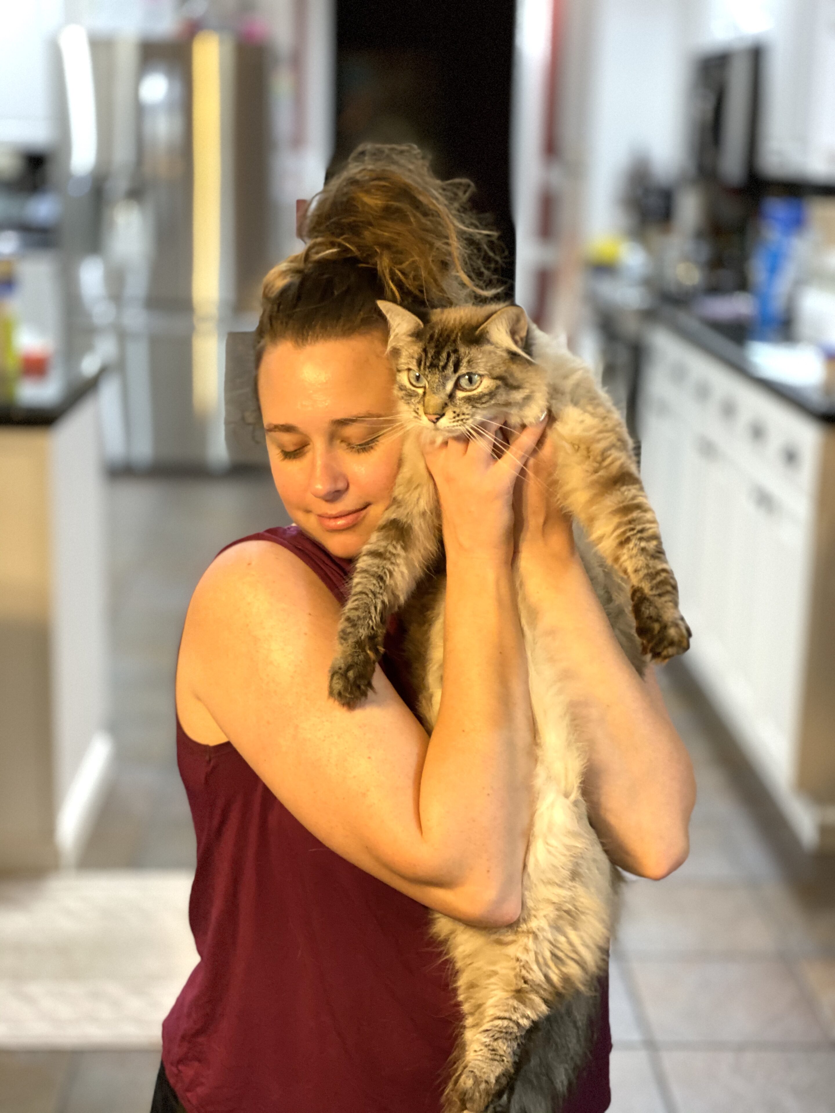 Fashion Blogger 50 Is Not Old's daughter with her cat, Thomas