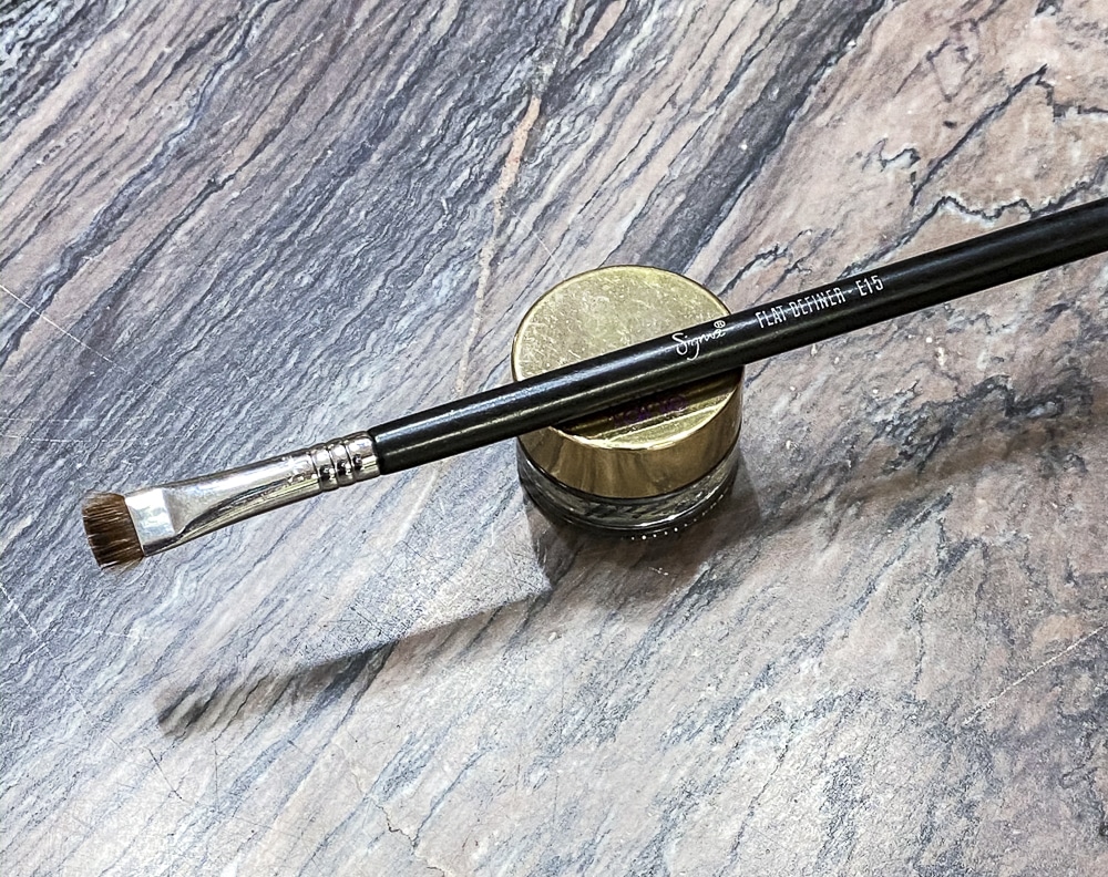 Fashion Blogger 50 Is Not Old is showing, Tarte Eyeliner clay pot and Sigma brush