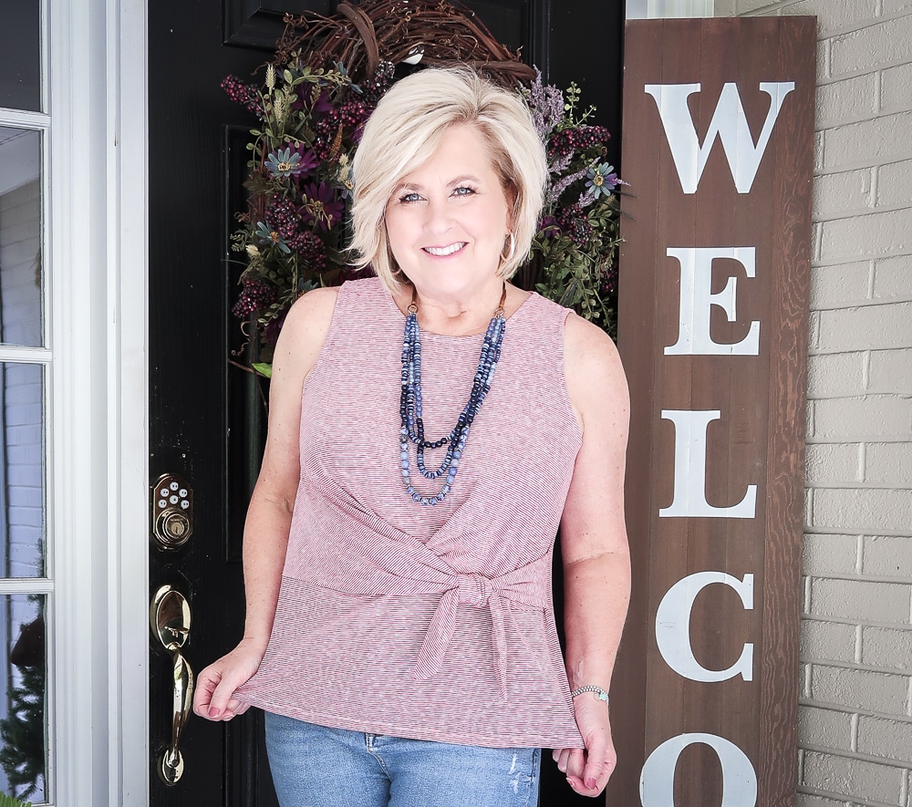 Fashion Blogger 50 Is Not Old is ready for Labor Day in her red white and blue top twist top