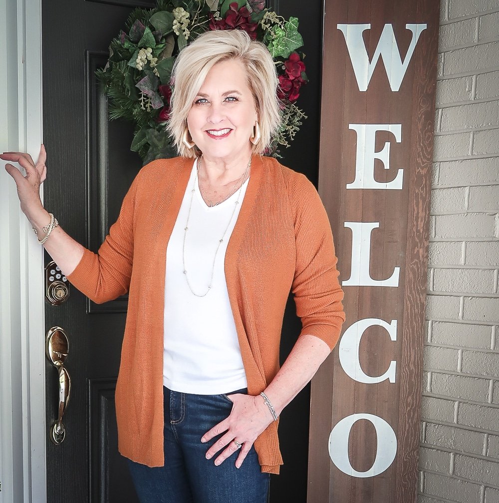 Fashion Blogger 50 Is Not Old is doing a Tuesday Try-On Session with Target and styling a rust cardigan and a white v-neck tee shirt