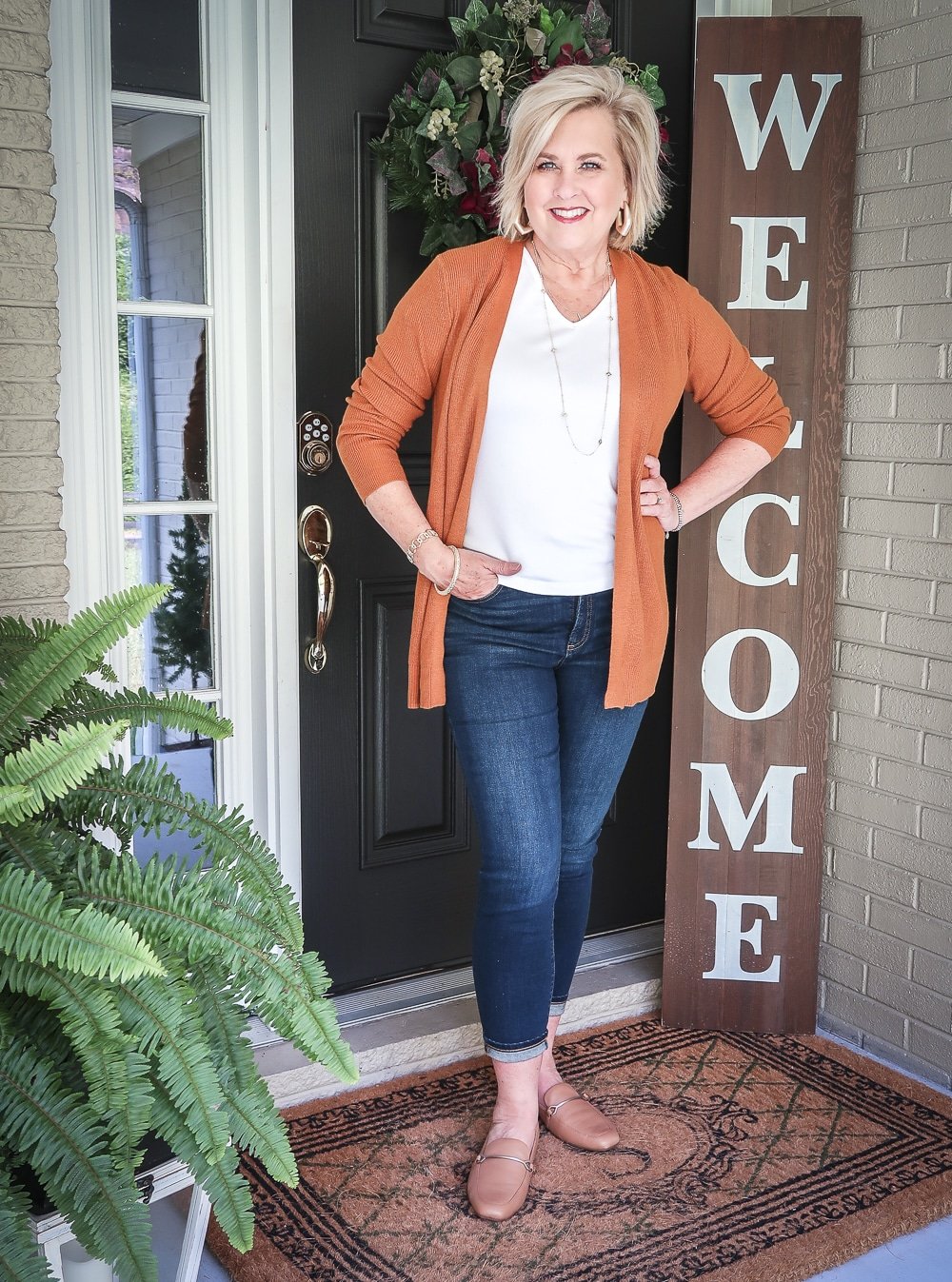 Fashion Blogger 50 Is Not Old is doing a Tuesday Try-On Session with Target and styling a rust cardigan with a white v-neck tee shirt