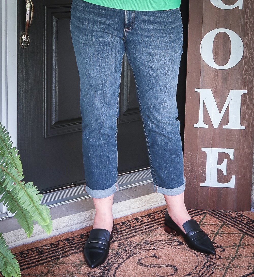 Fashion Blogger 50 Is Not Old is wearing girlfriend crop jeans, and black pointy loafers