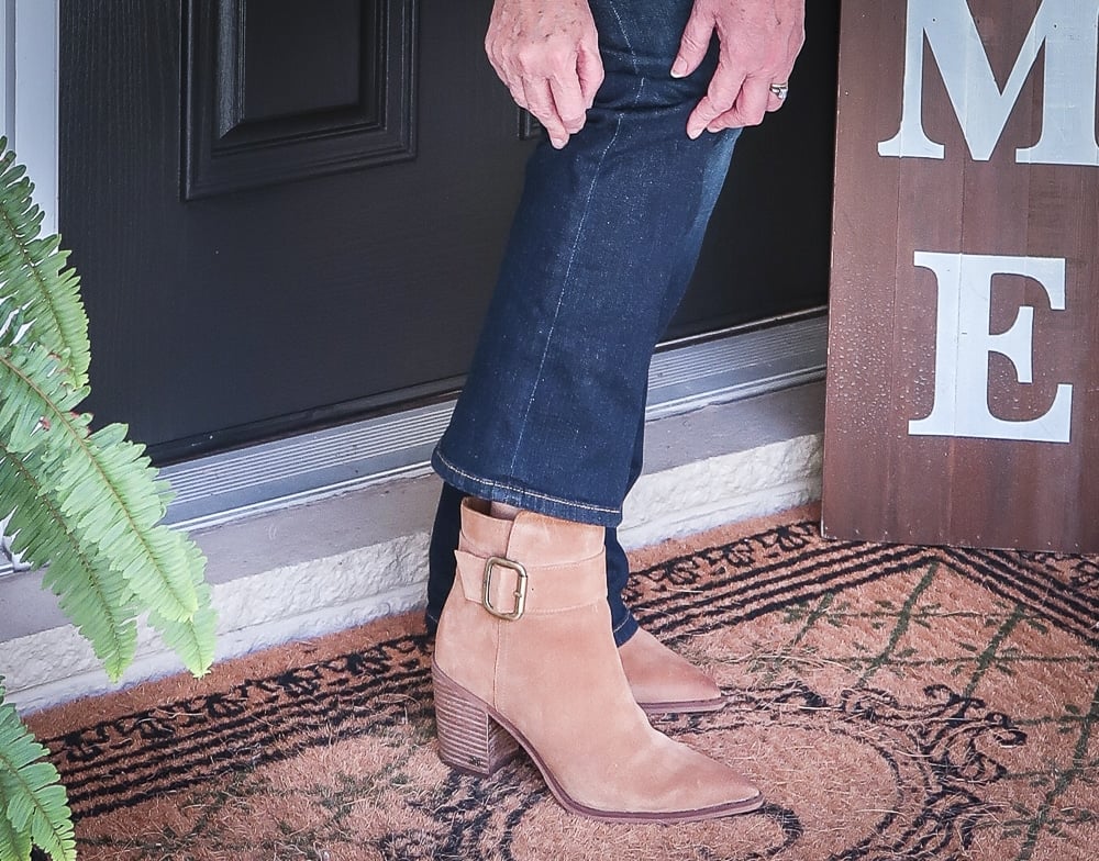 Fashion Blogger 50 Is Not Old is wearing bootcut jeans and ankle boots for fall