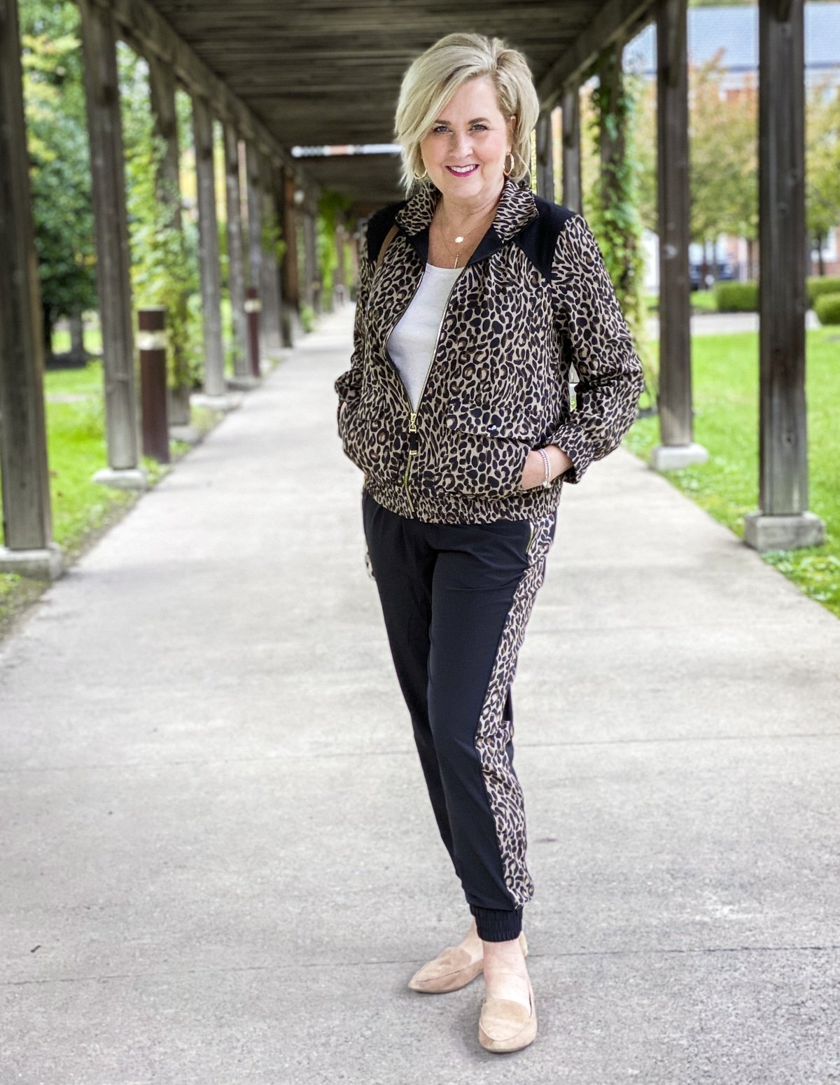 Fashion Blogger 50 Is Not Old is comfy and chic in a Cheetah print jacket and joggers from Chicos