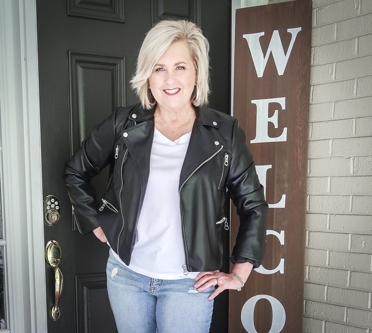 Fashion Blogger 50 Is Not Old keeps looking young with a faux leather moto jacket