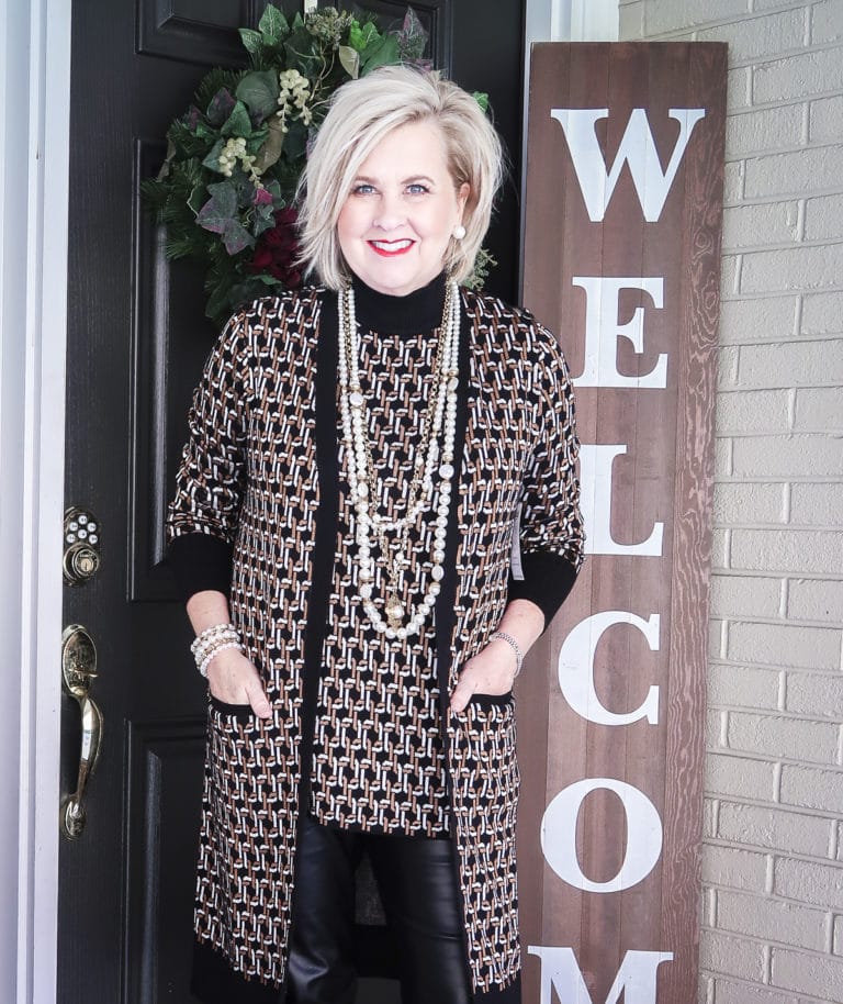 Fashion Blogger 50 Is Not Old is looking chic in this geometric patterned tank and cardigan