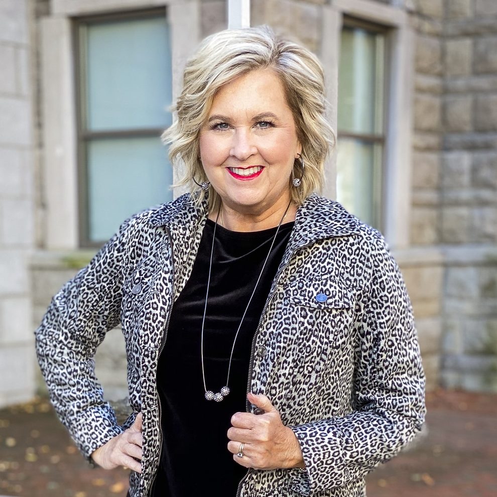 Fashion Blogger 50 Is Not Old is wearing a black velvet tank top and an animal print jacket from Chico's