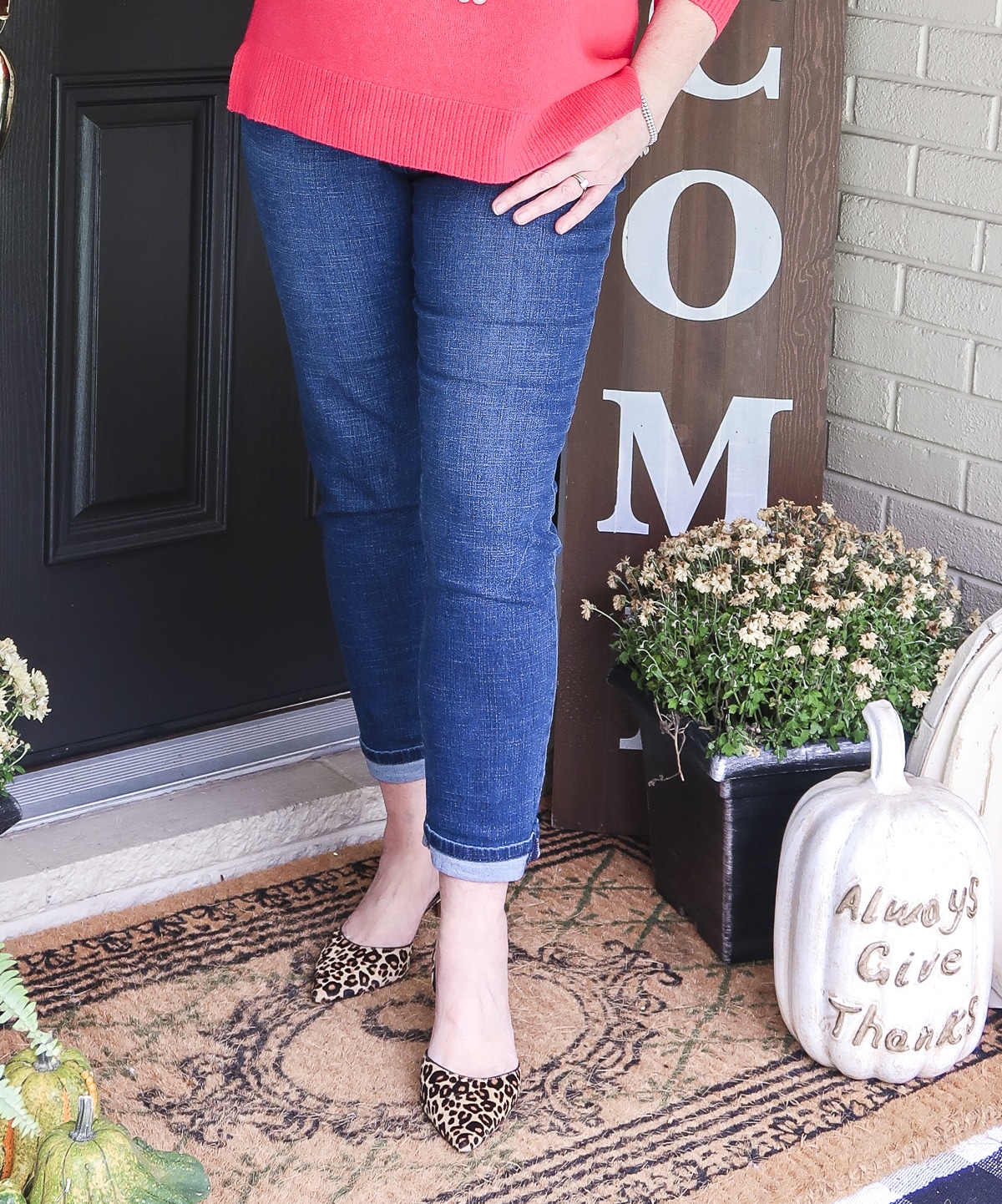 Fashion Blogger 50 Is Not Old is wearing ankle jeans, and leopard print heels