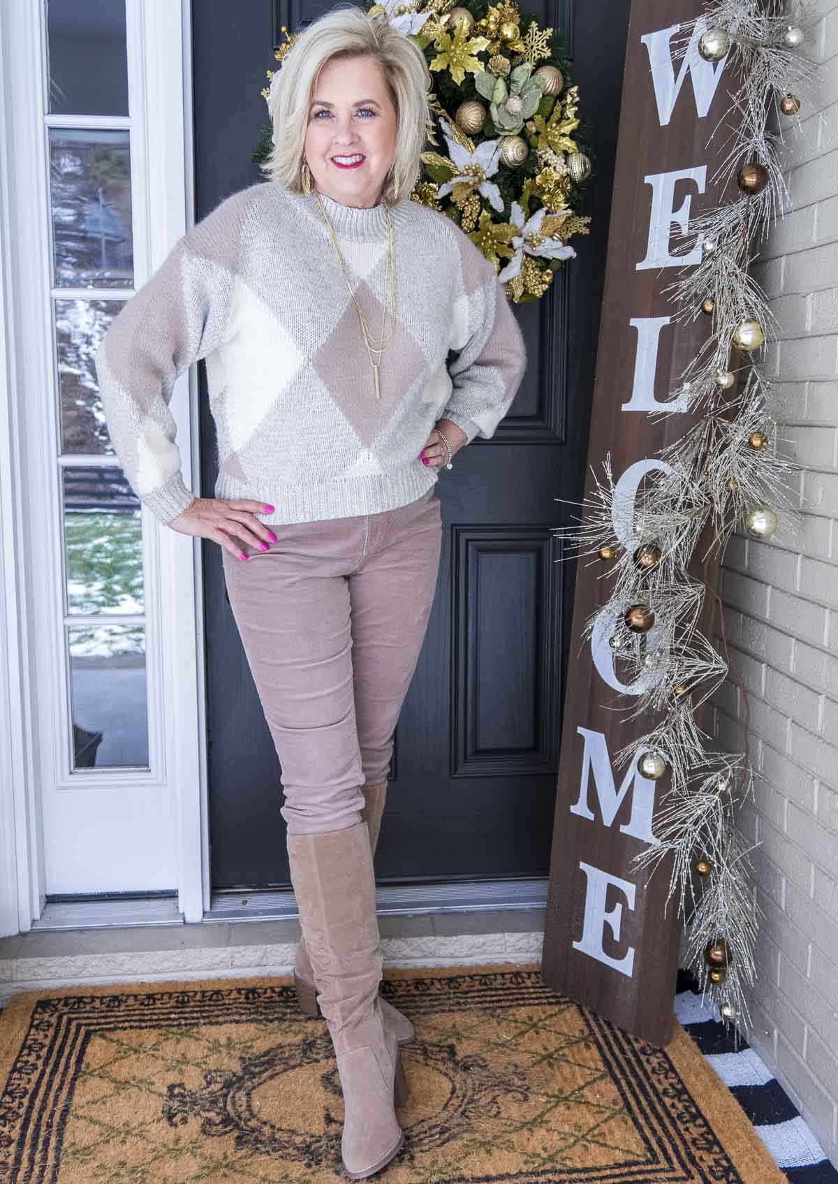 Fashion Blogger 50 Is Not Old is wearing an argyle sweater from Ann Taylor with a pair of taupe corduroy skinny pants from Loft. A pair of scrunch knee boots from Target finished the look.