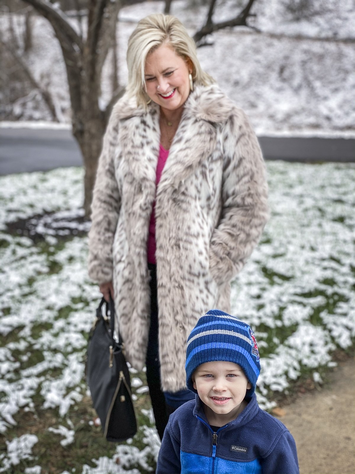 FASHION BLOGGER 50 IS NOT OLD is watching her grandson in a faux fur coat by Karl Lagerfeld