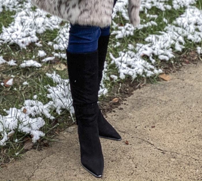 FASHION BLOGGER 50 IS NOT OLD is wearing black suede boots