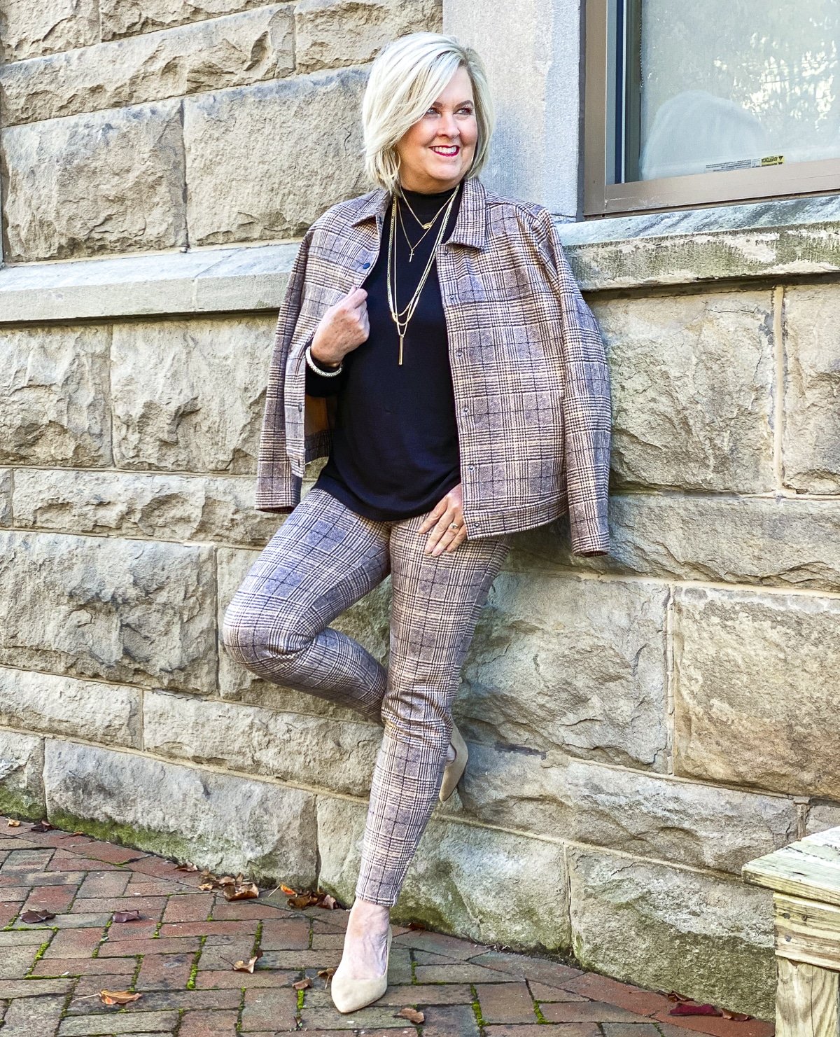 Fashion Blogger 50 Is Not Old is wearing a Glen Plaid jacket and pants with a black mock turtleneck from Liverpool Los Angeles