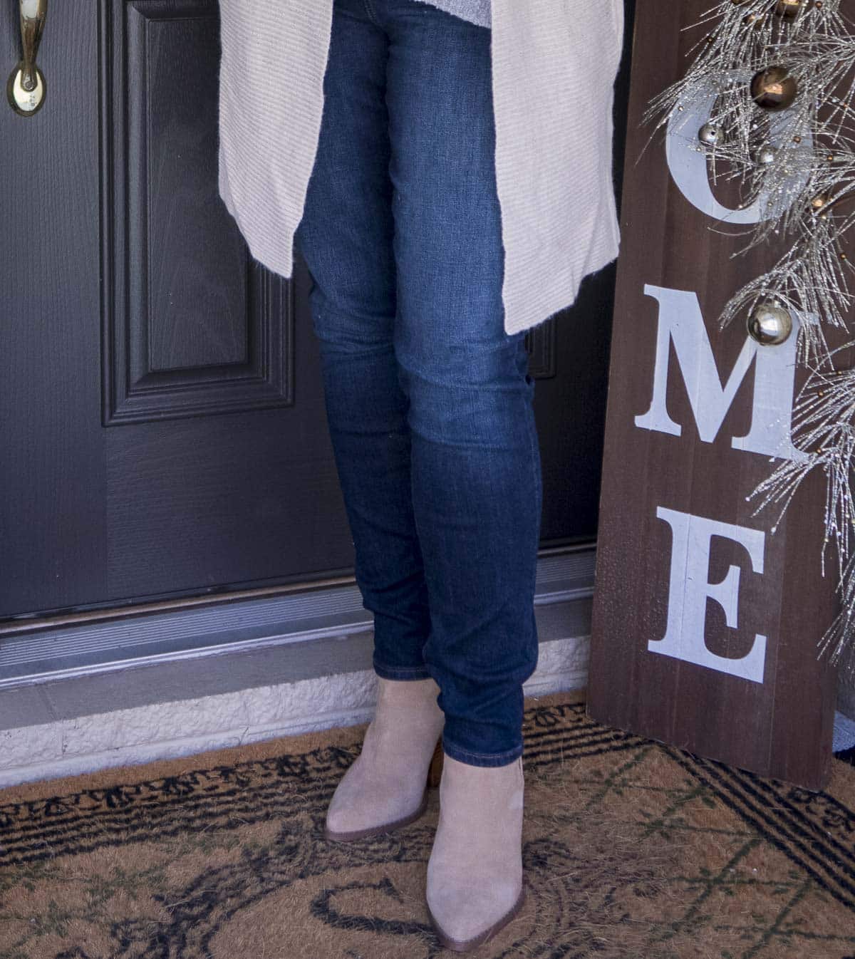 Fashion Blogger 50 Is Not Old is wearing skinny jeggings from Chico's, and pointy toe ankle boots