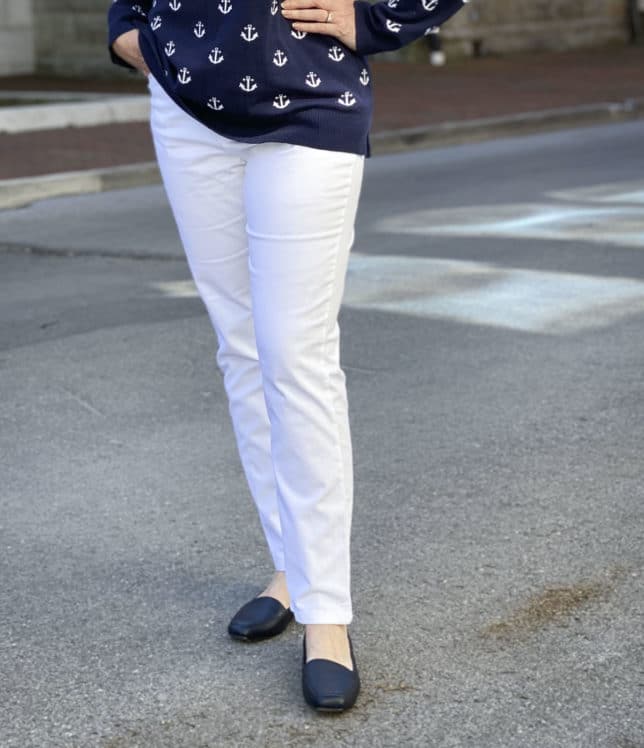 Fashion Blogger 50 Is Not Old is looking like spring in white ankle pants and navy flats