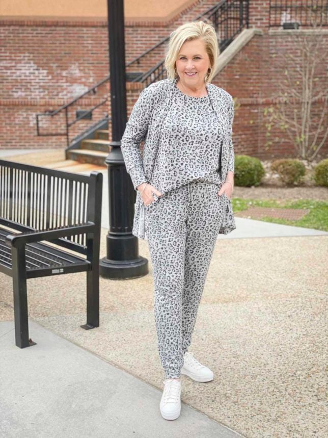 Fashion Blogger 50 Is Not Old is wearing animal print luxe loungewear from Chico's and Ked's platform sneakers