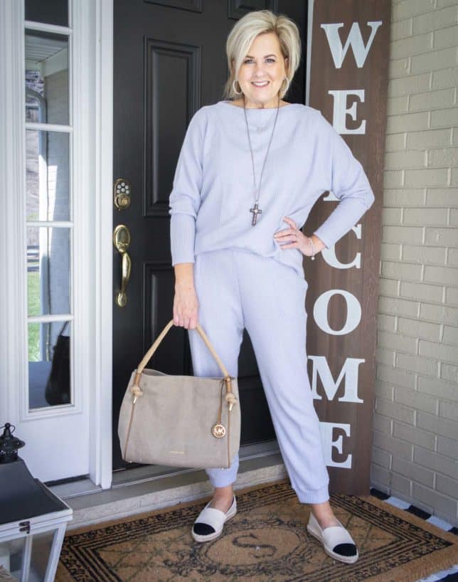 Fashion Blogger 50 Is Not Old is wearing a light blue loungewear sweater set with espadrille shoes