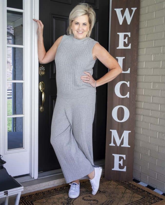 Fashion Blogger 50 Is Not Old is wearing a gray cropped sweater loungewear set from Target with Sperry sneakers
