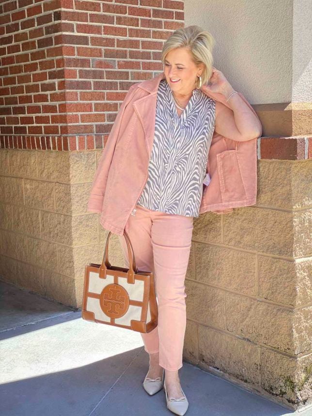 Fashion Blogger 50 Is Not Old is proving that you can wear a moto jacket no matter your age in this beautiful blush look