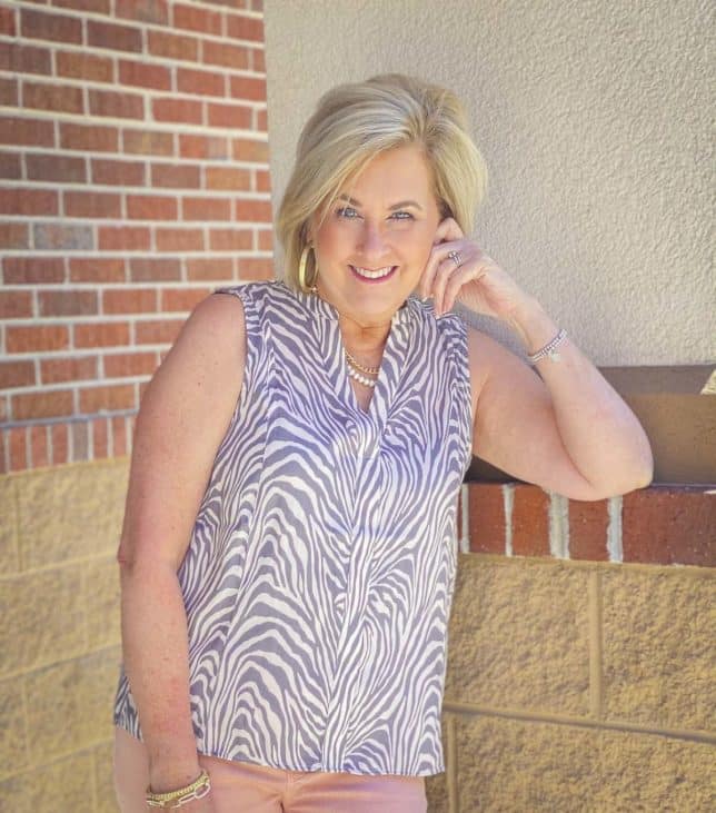 Fashion Blogger 50 Is Not Old is wearing a zebra print top 