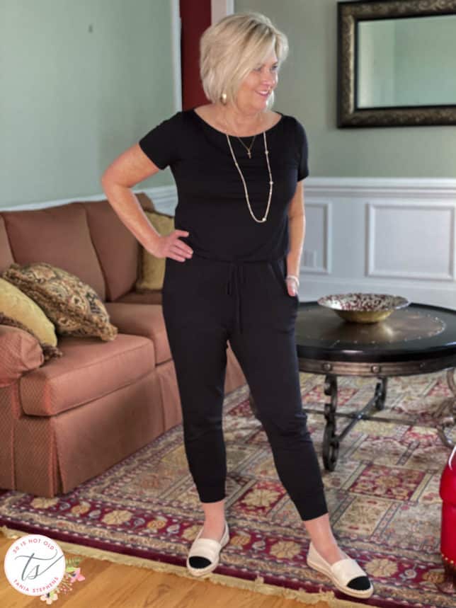 Fashion Blogger 50 Is Not Old is wearing a black jumpsuit from Gibsonlook