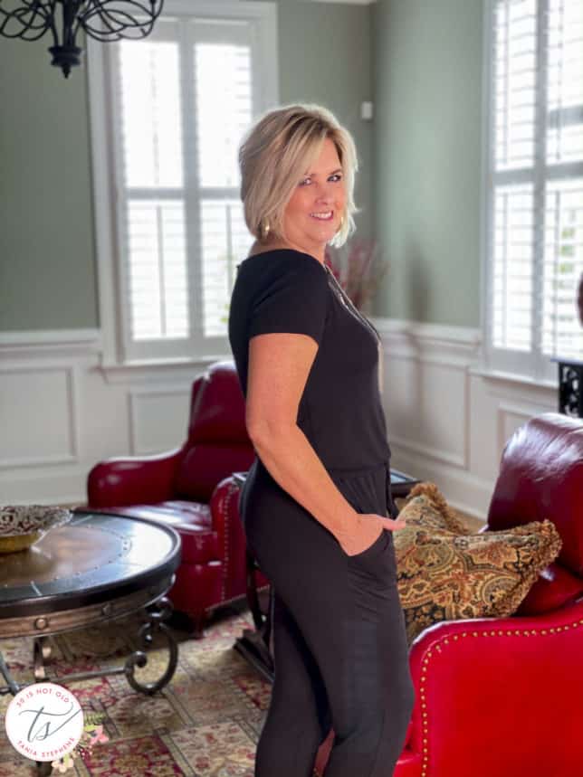 Fashion Blogger 50 Is Not Old is showing the back of a black jumpsuit