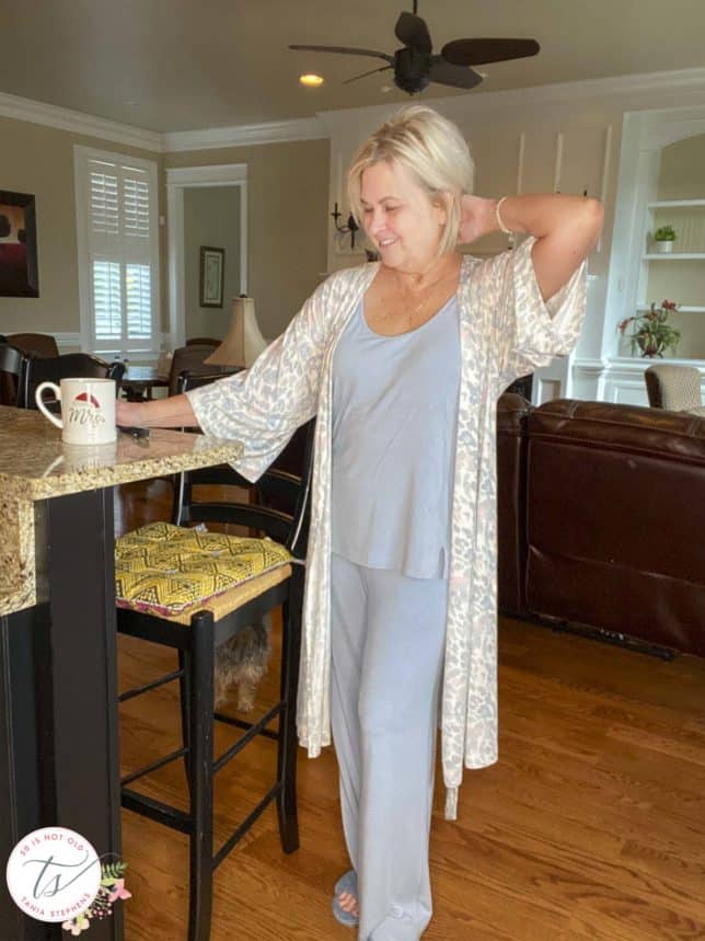 Fashion Blogger 50 Is Not Old is standing in her kitchen wearing Soma pajamas