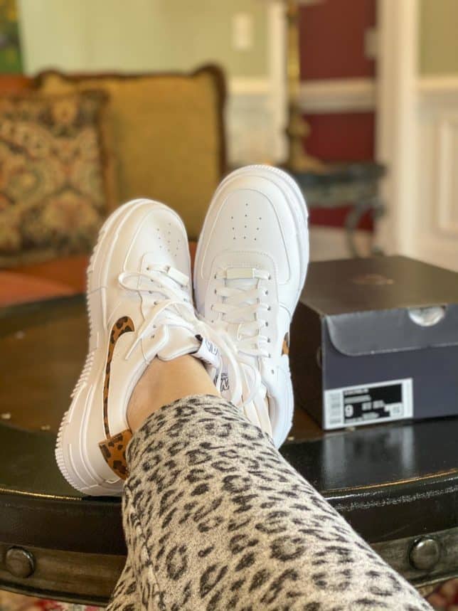 Fashion Blogger 50 Is Not Old is wearing white sneakers with leopard print for summer