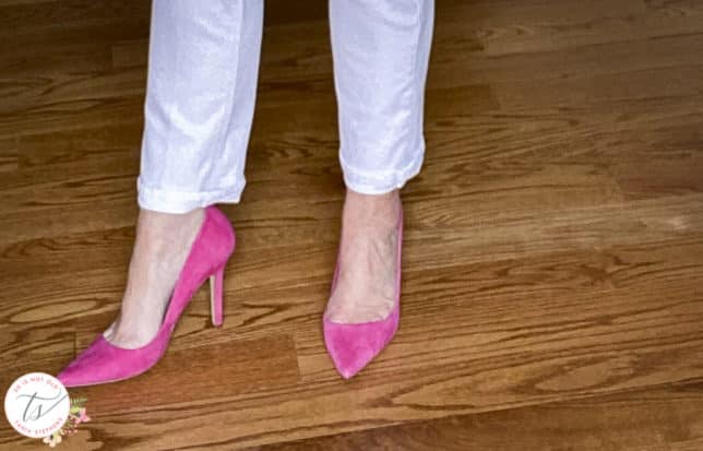 Fashion Blogger 50 Is Not Old is wearing bright pink suede pumps