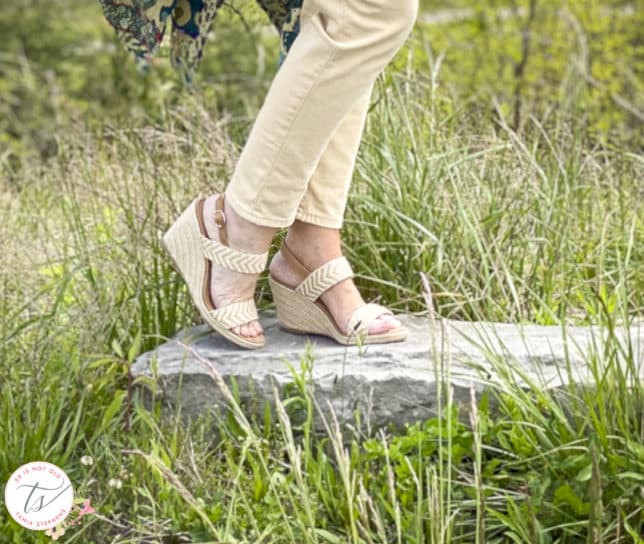 Fashion Blogger 50 Is Not Old is wearing pale gold jeans with neutral wedge sandals