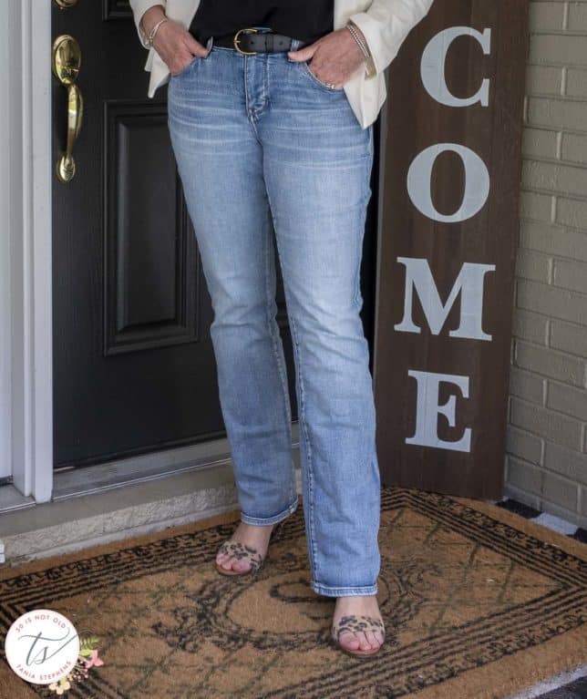 Fashion Blogger 50 Is Not Old is wearing light wash jeans and leopard print heels by Vince Camuto