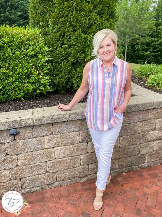 Fashion Blogger 50 Is Not Old will be cool this Memorial Day in a 100% linen striped tunic top and white straight leg jeans