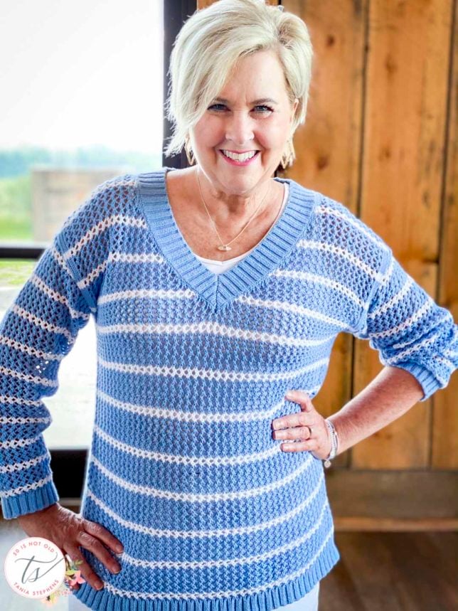 Fashion Blogger 50 Is Not Old is wearing a blue and white striped mesh sweater from Talbots