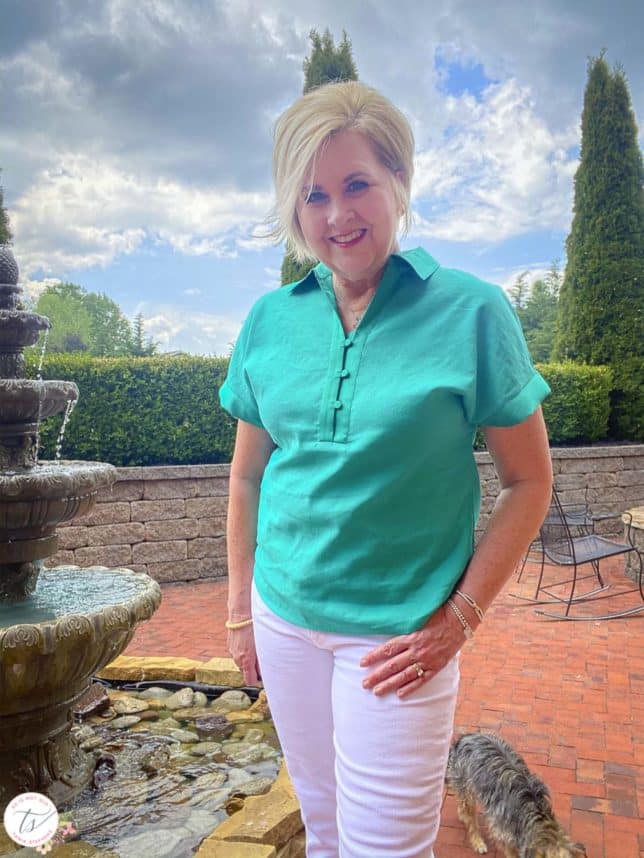 Fashion Blogger 50 Is Not Old is wearing a jade linen pullover shirt