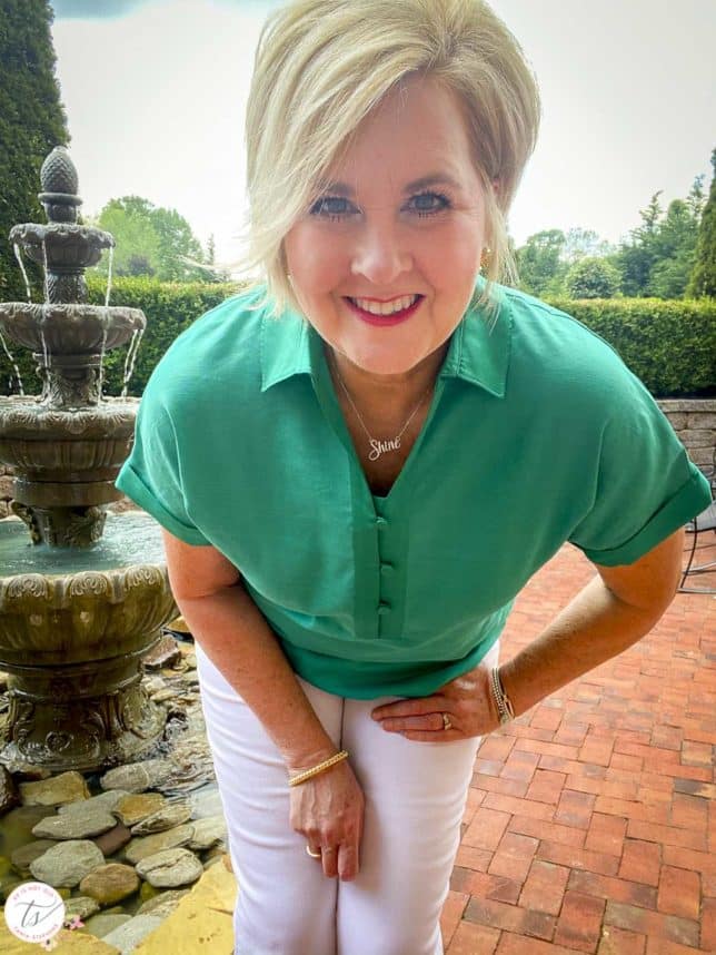 Fashion Blogger 50 Is Not Old is wearing a jade linen pullover shirt with a Shine necklace