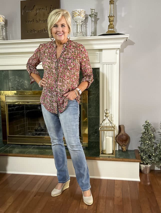 Fashion Blogger 50 Is Not Old is wearing a floral button-up blouse with bootcut jeans by Jag Jeans and neutral wedge espadrilles